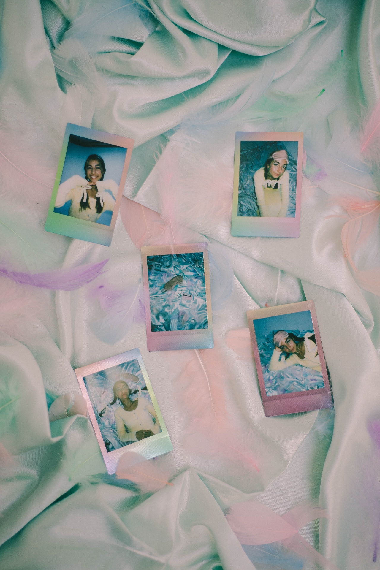 Soft pastel Nothing Mattress polaroids on satin fabric